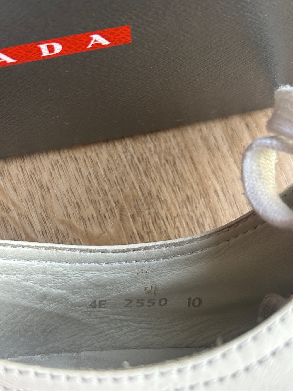Prada White Leather Sneakers with Red Logo Detail - Picture 13 of 13
